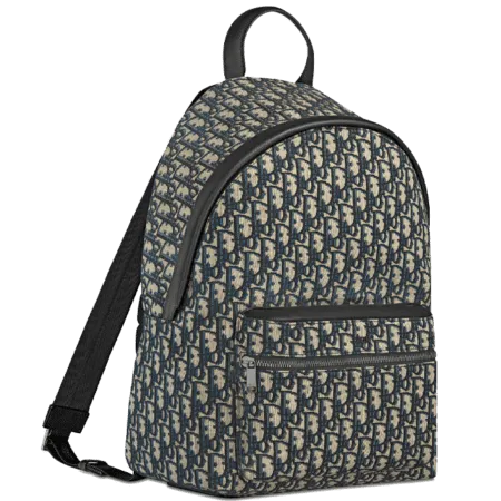 Dior Rider Backpack in beige and black Dior Oblique jacquard with rubber 'DIOR' signature and adjustable padded straps.